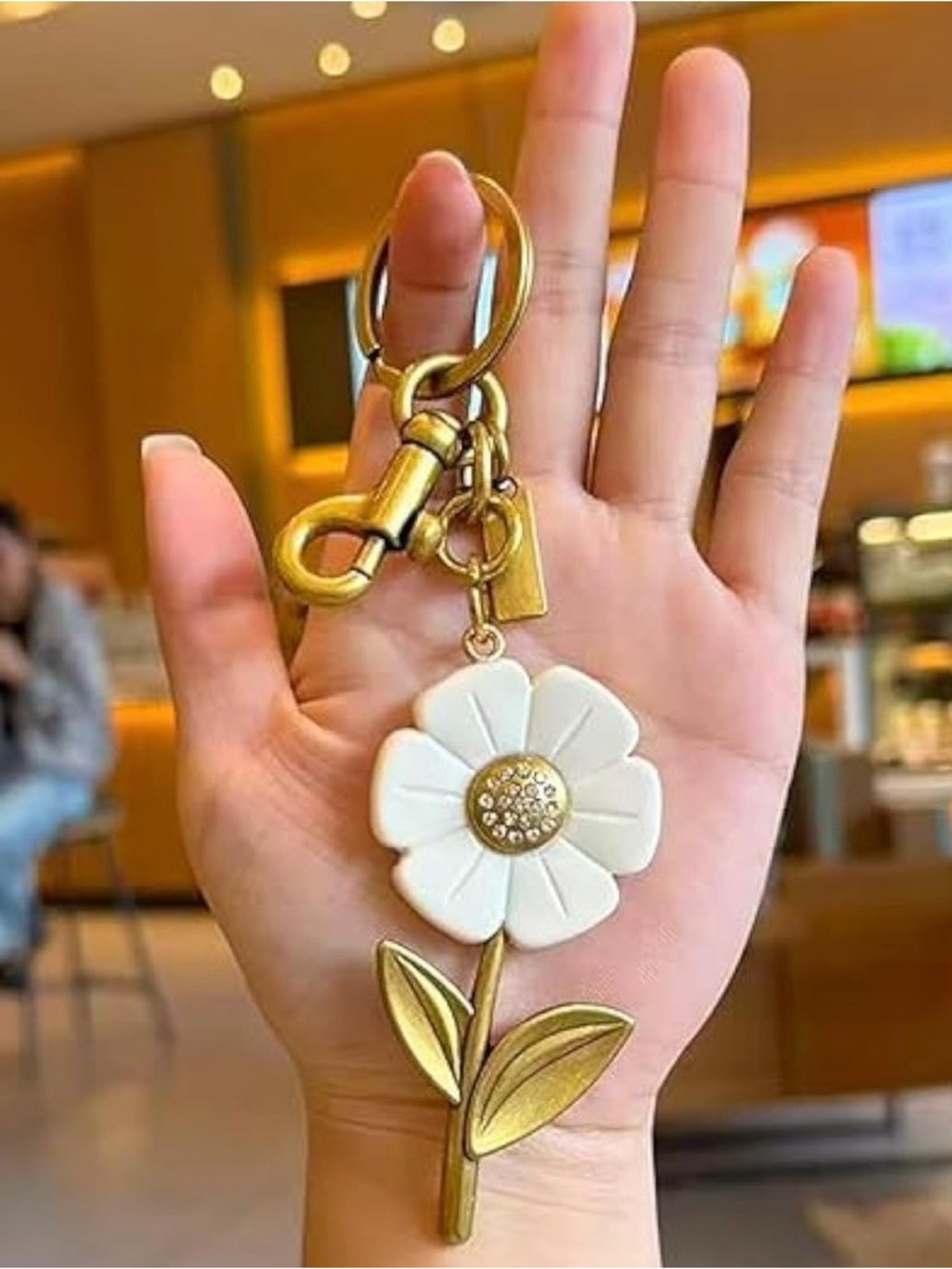 Coach White Flower Key & Bag Charm with Gold-Tone Stem - Picture 3 of 3